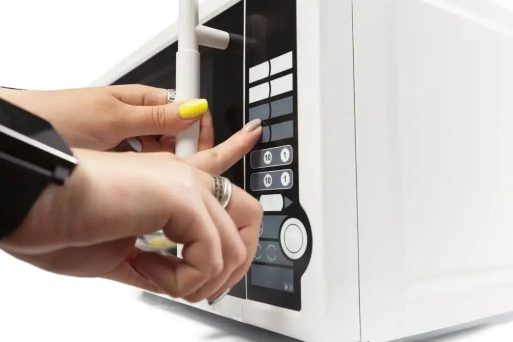 Microwave repair specialist unlocking Panasonic microwave